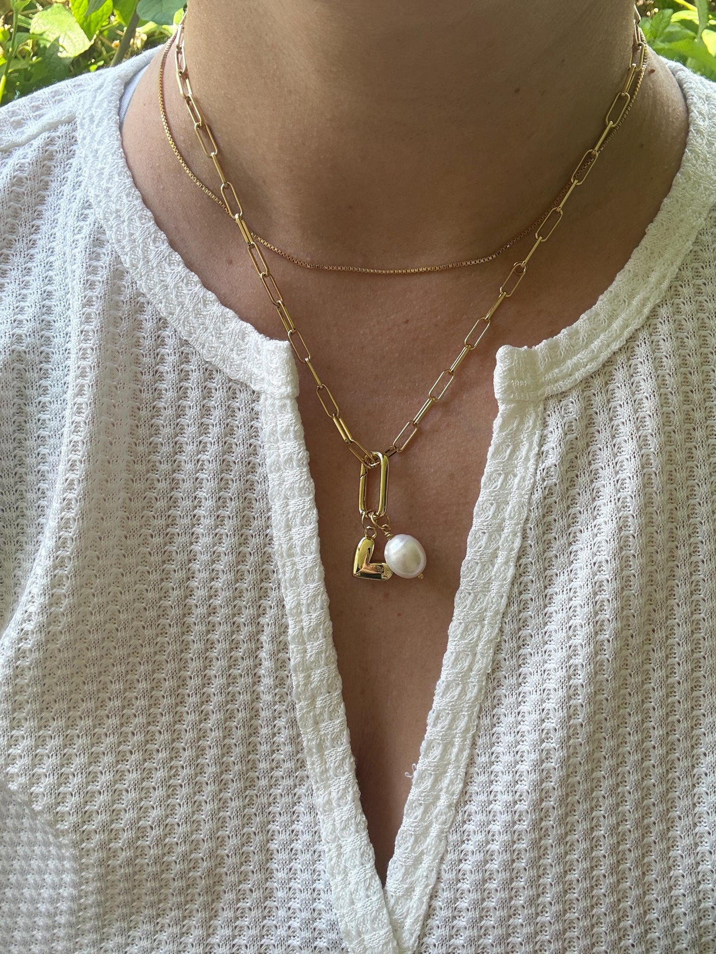Hanging pearl and heart necklace